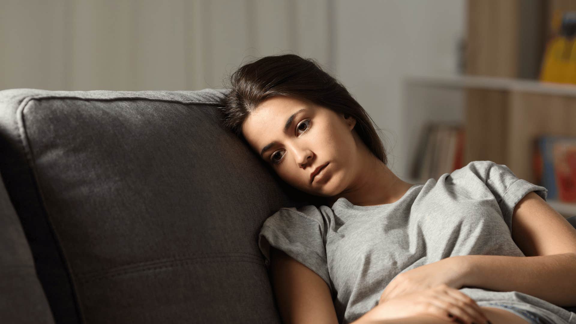 woman sitting on couch 