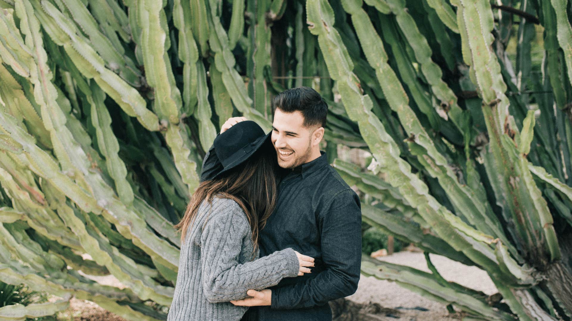 man hugging a woman