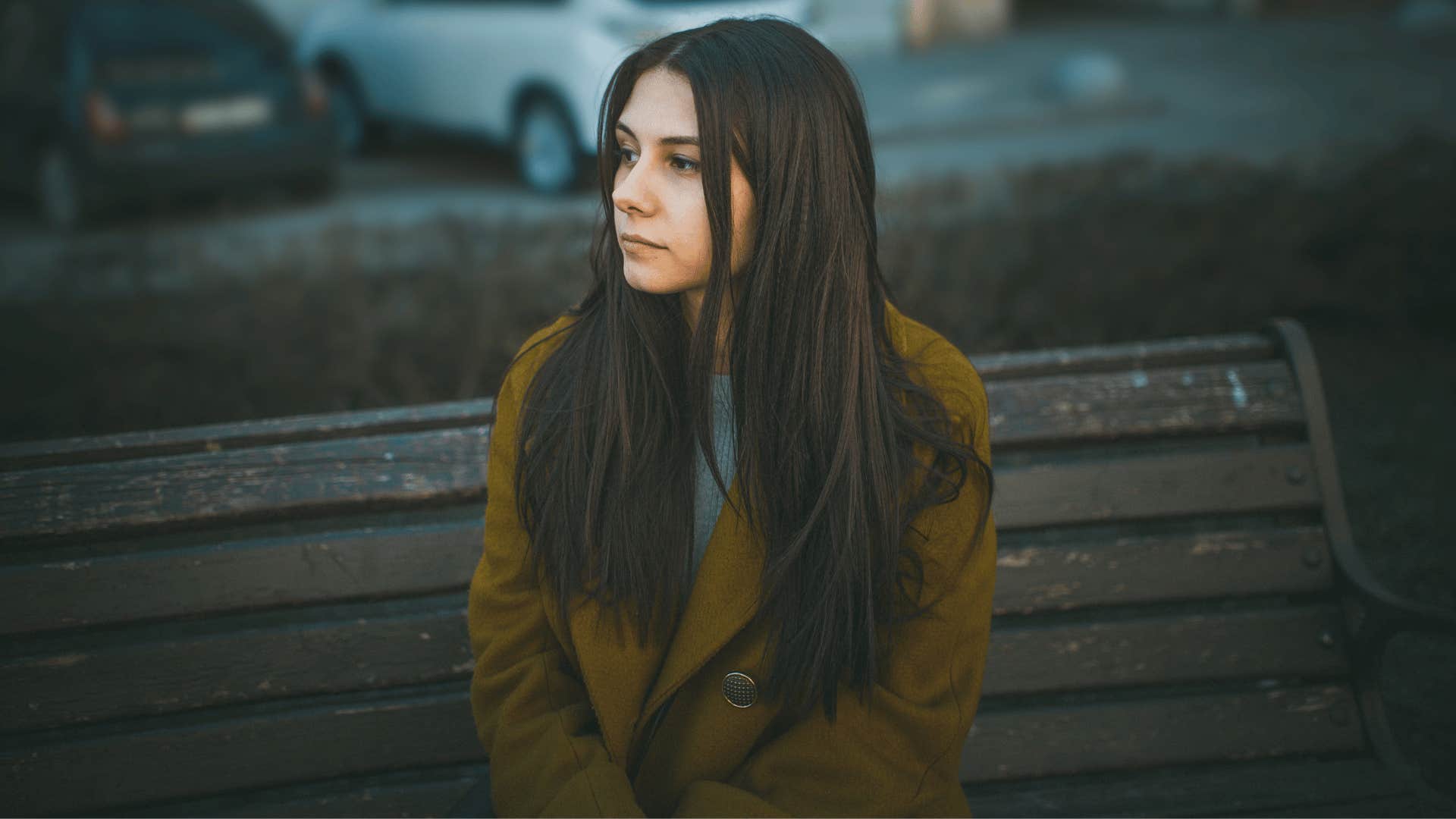 woman sitting on bench 