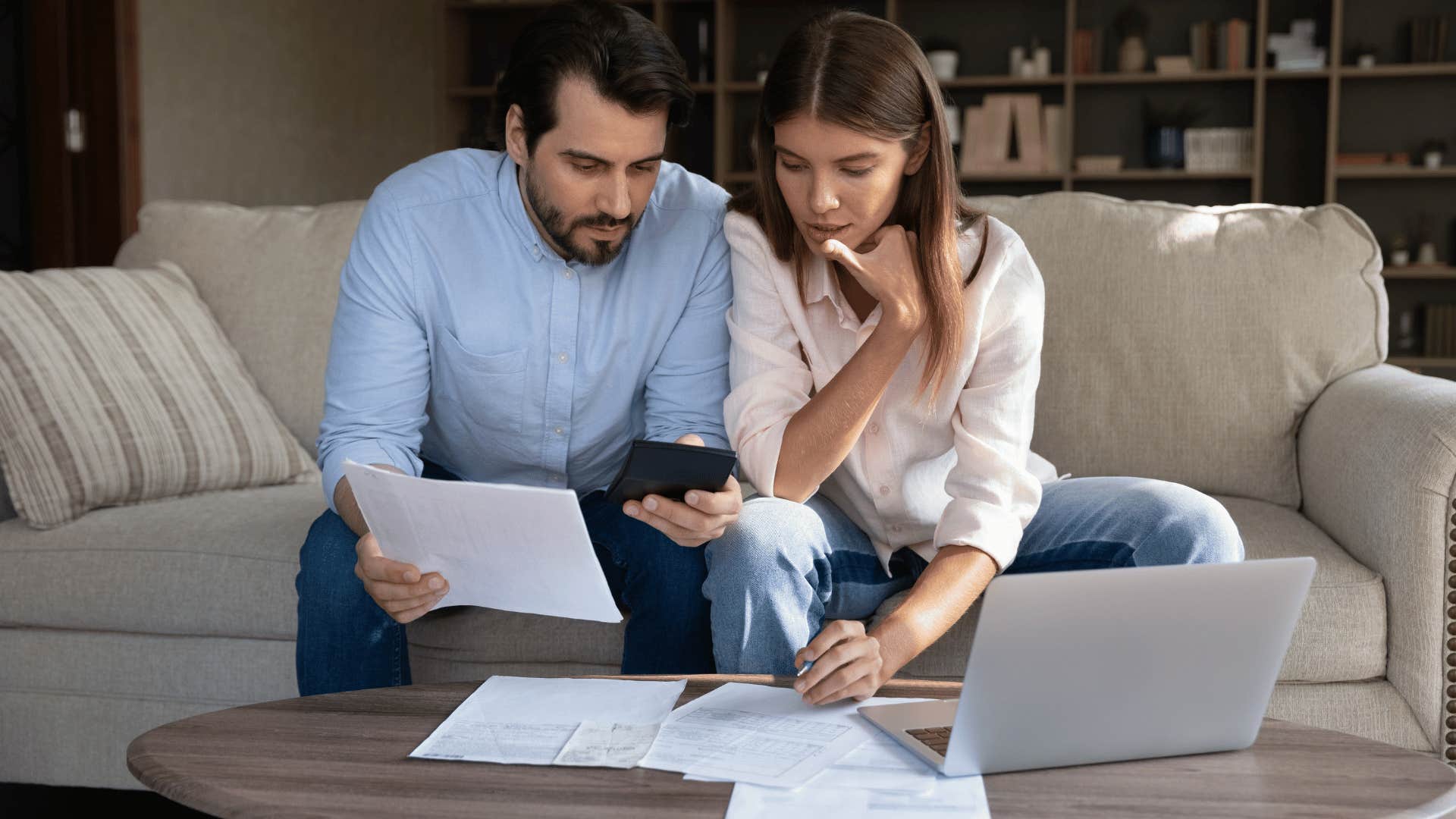 couple looking over finances together 