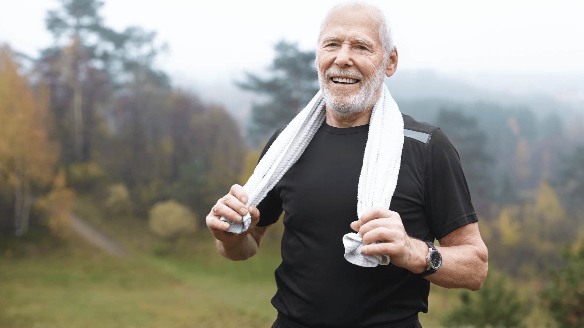 man catching breath after exercising 