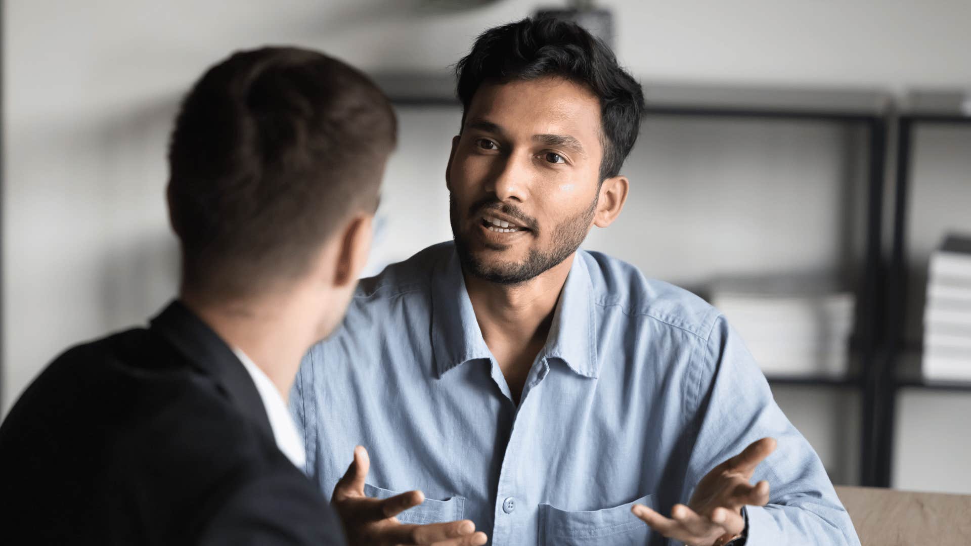 two coworkers talking