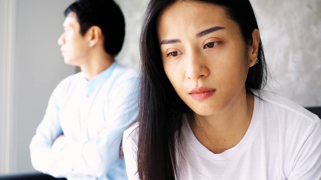 Woman knowing relationship she is in, is unhealthy. Pretending in front of others.