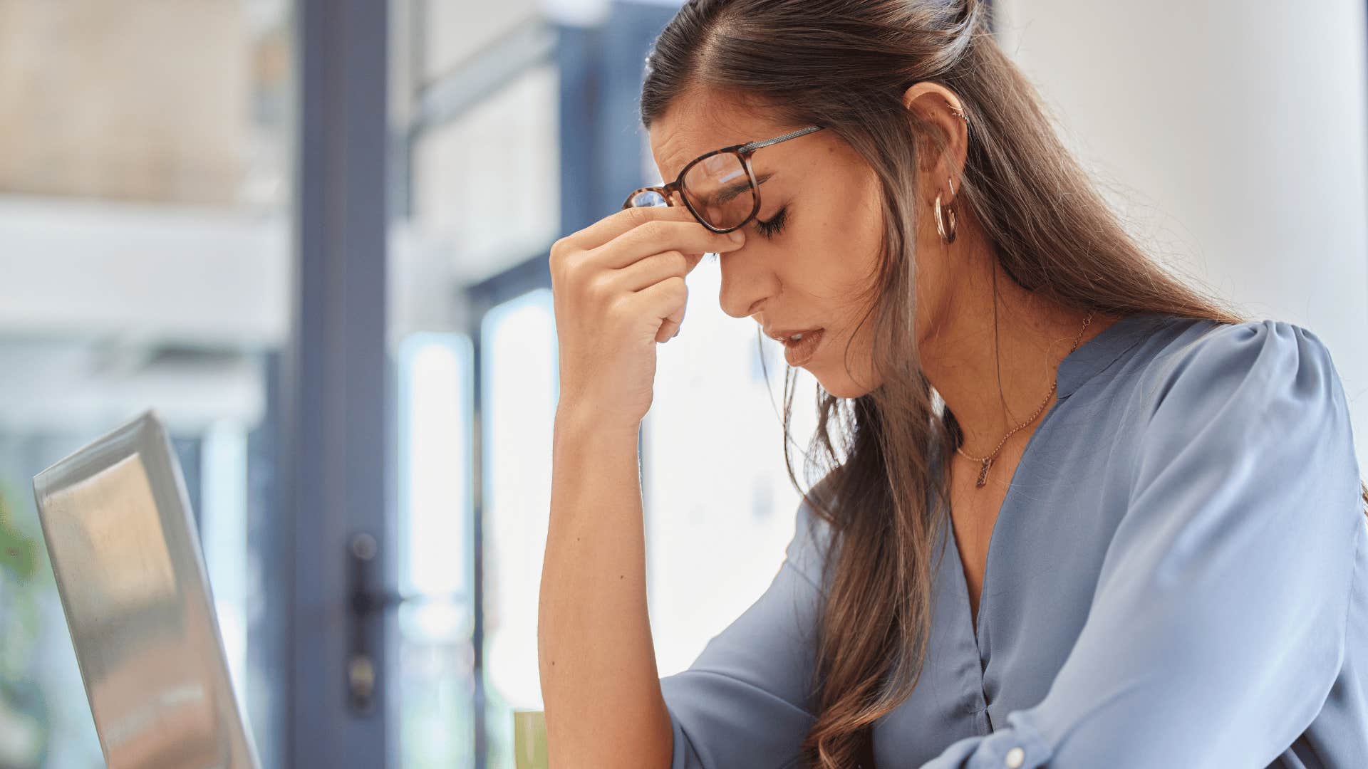 stressed out woman at computer 