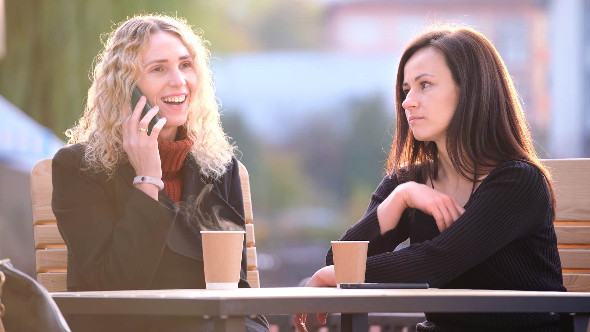 woman being ignored by friend 