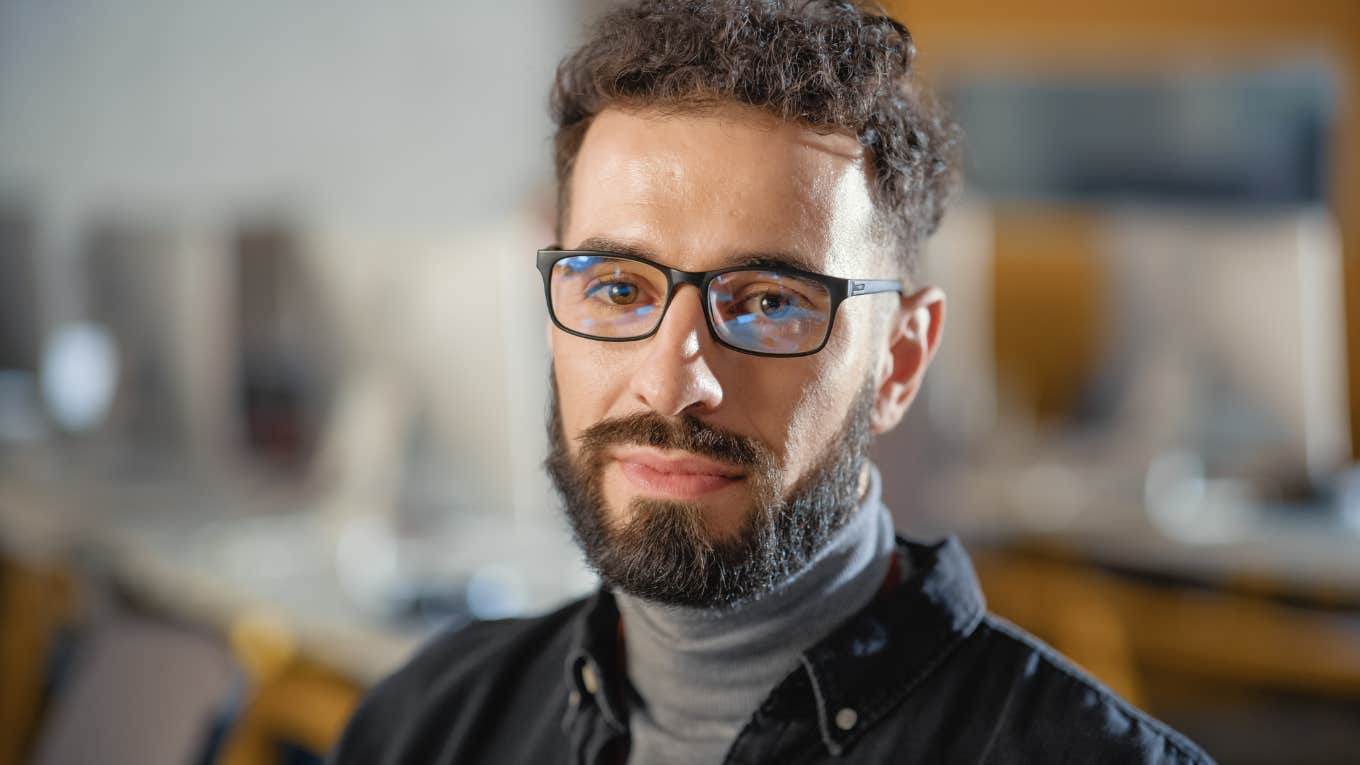 serious man with glasses looking intelligent