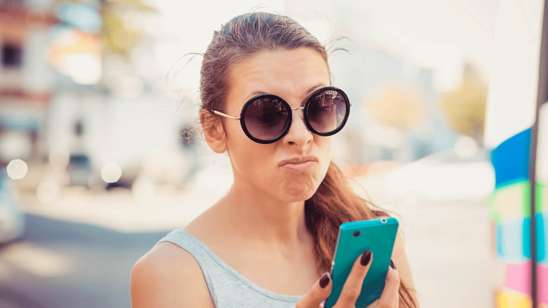 woman looking at her phone