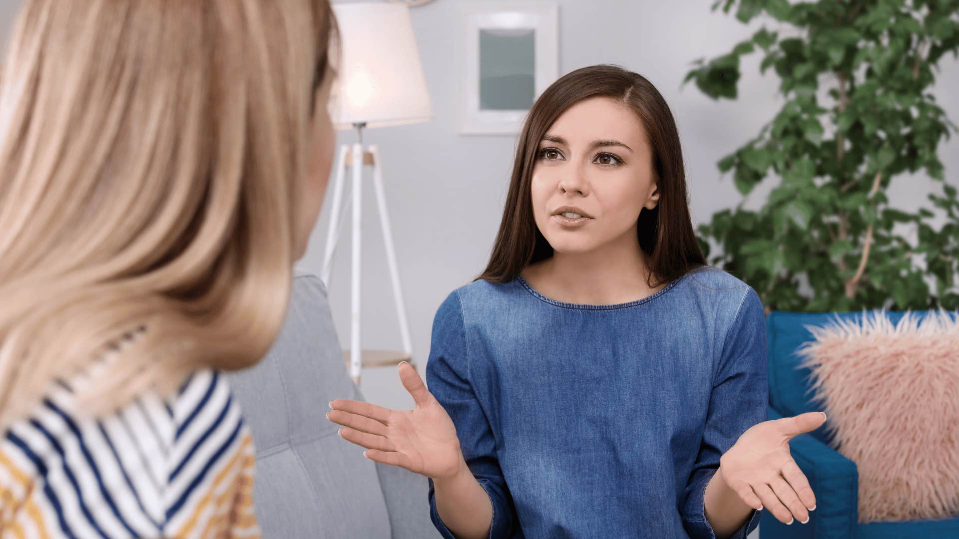 woman having a tense conversation with friend