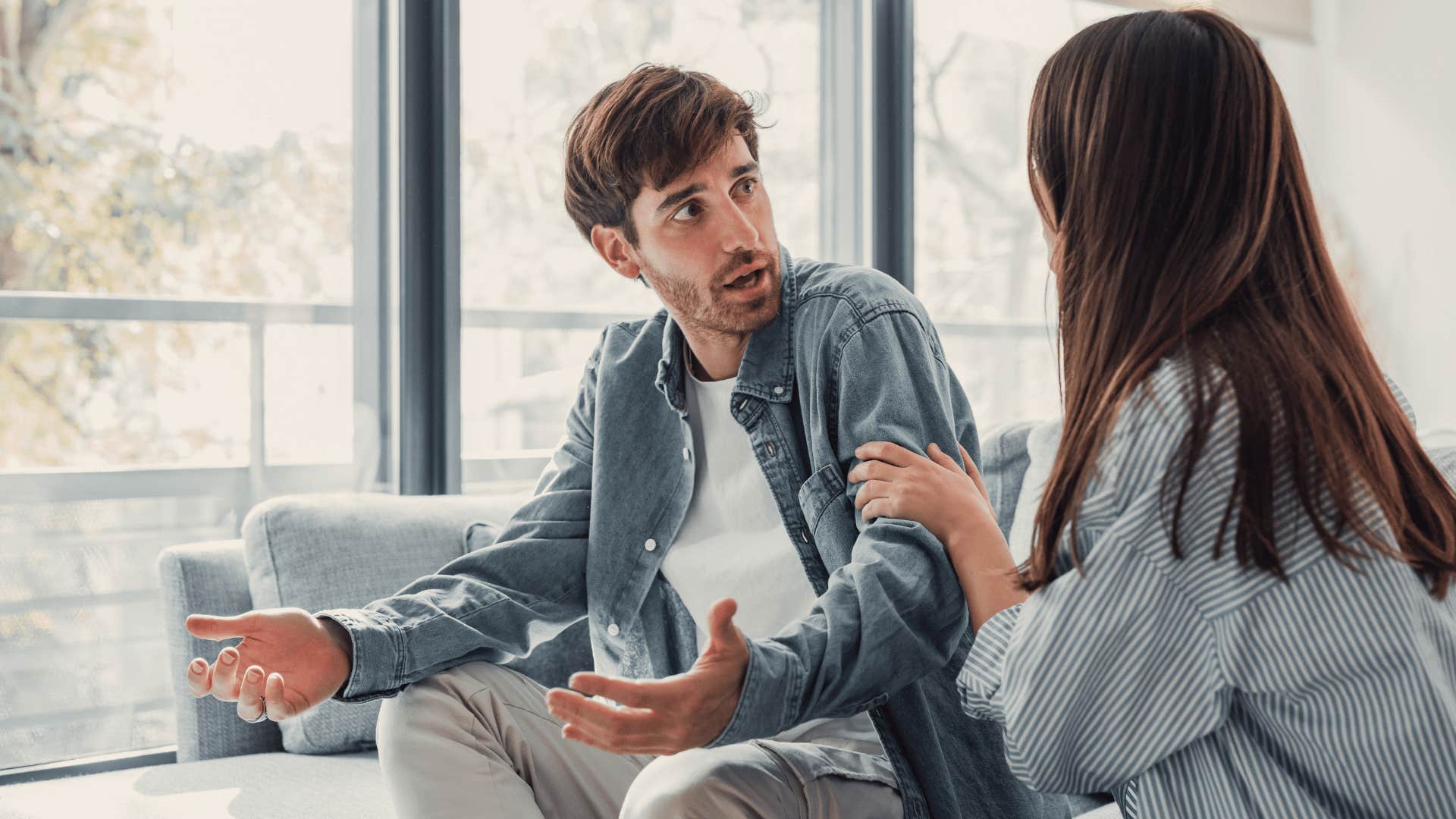 man looking annoyed with wife 