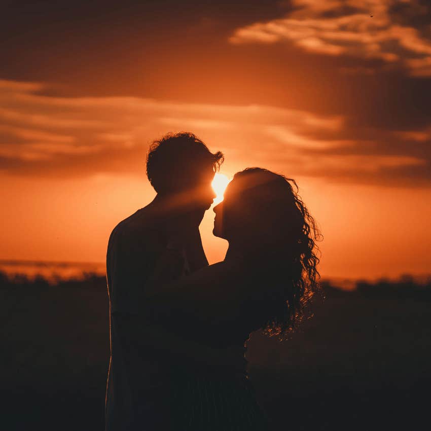 silhouette of couple at sunset