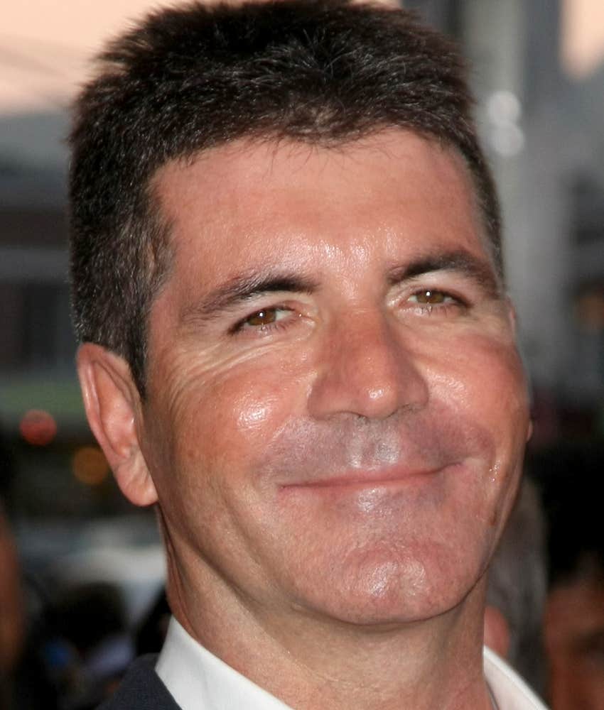 Simon Cowell grinning