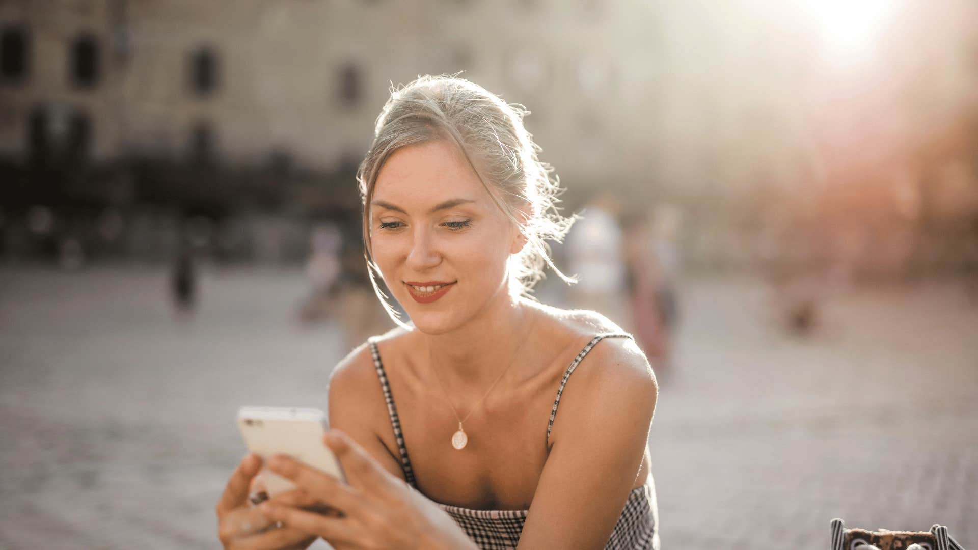 woman smiling at text