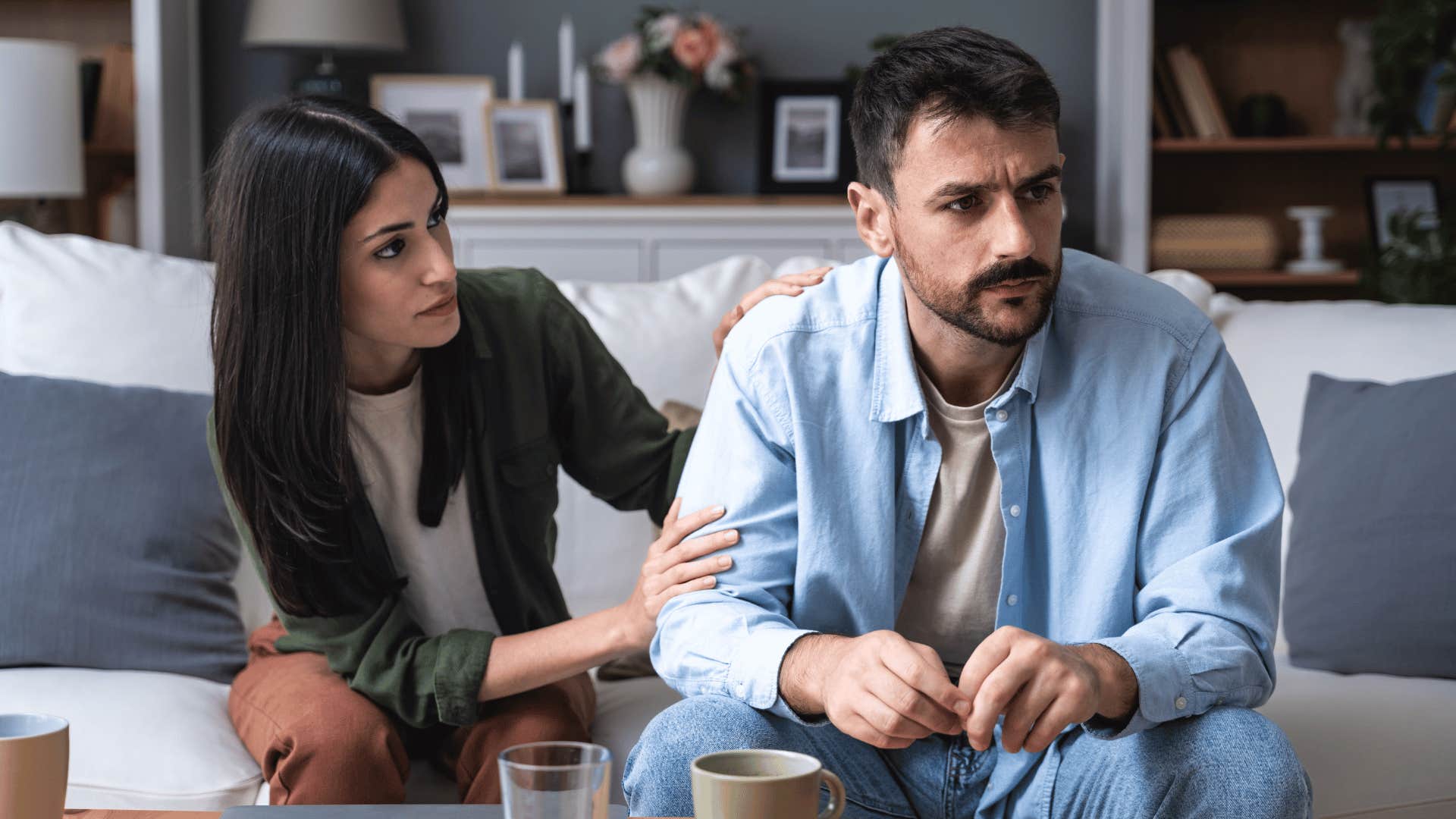 couple arguing on couch