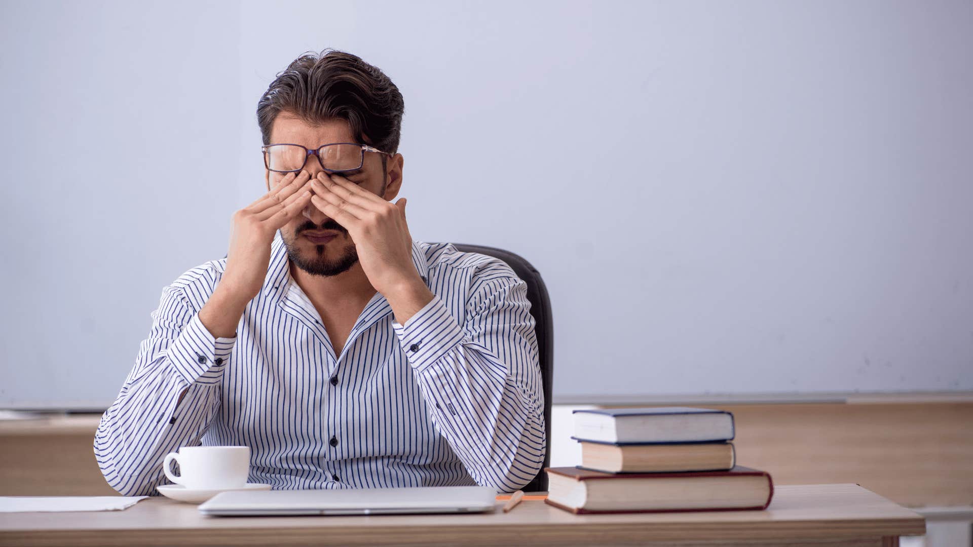 frustrated man at desk 