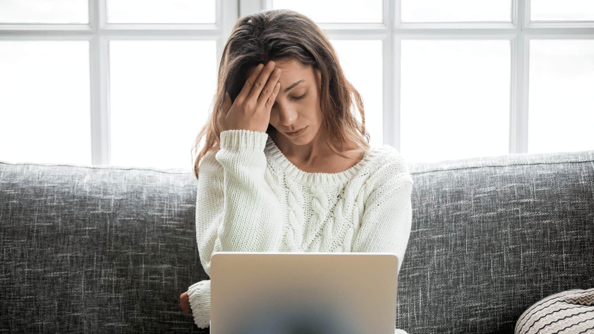 frustrated woman at computer 