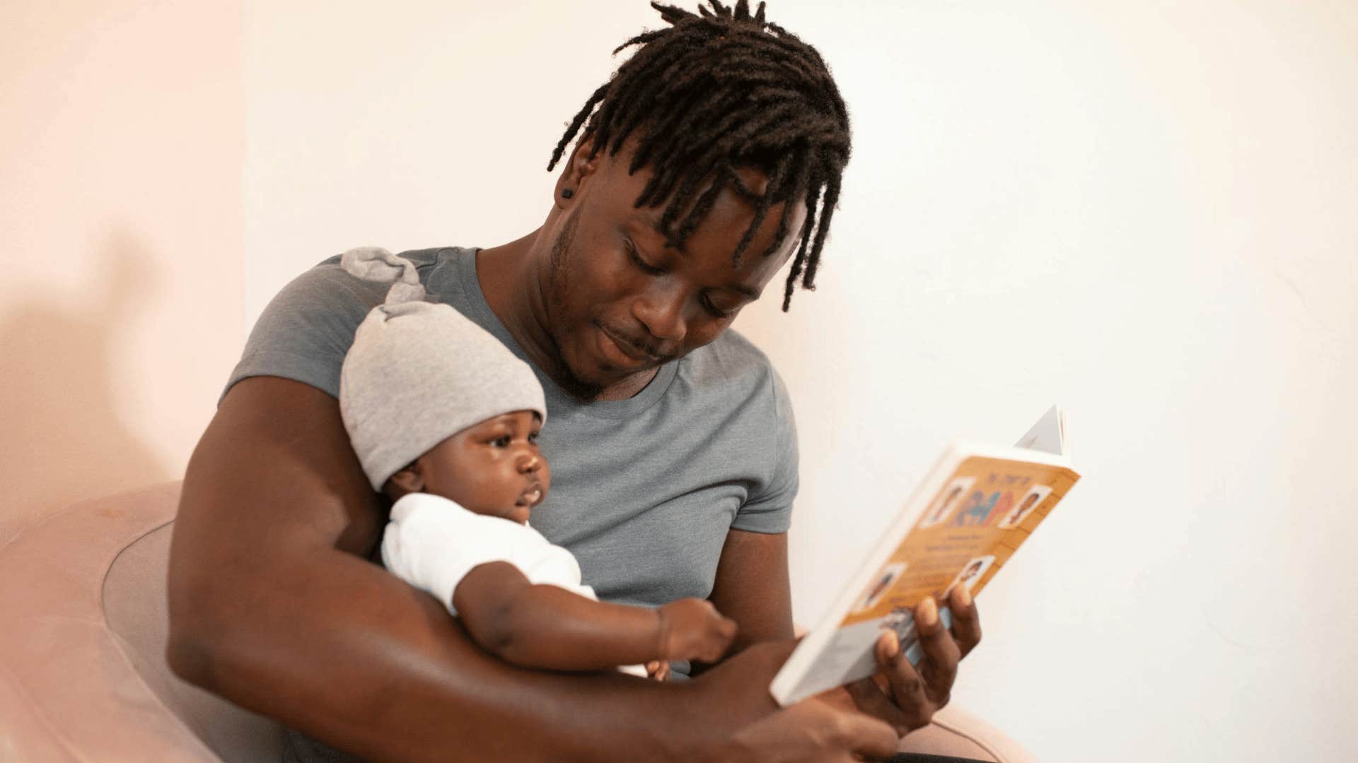 father reading to child