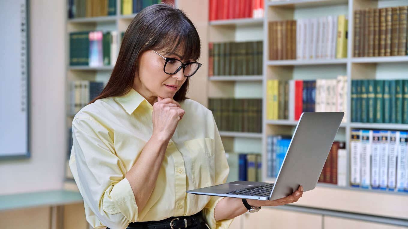 Teacher reading students' nasty comments