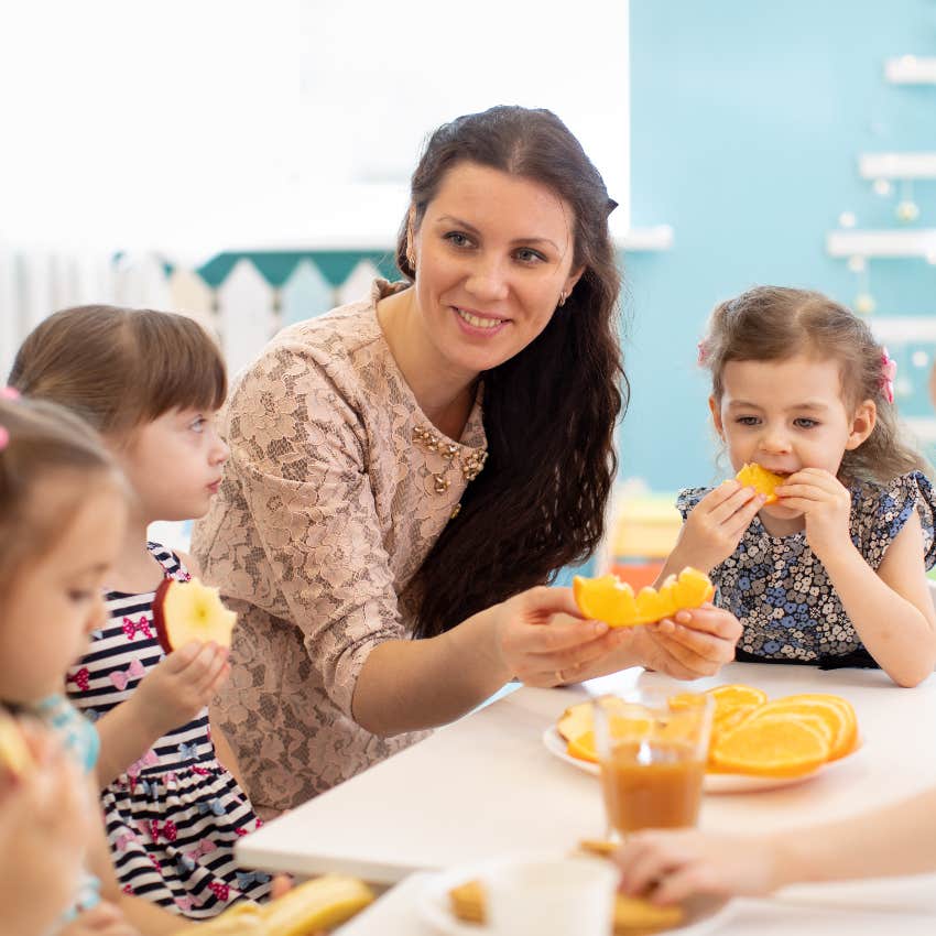 Teacher feeding students