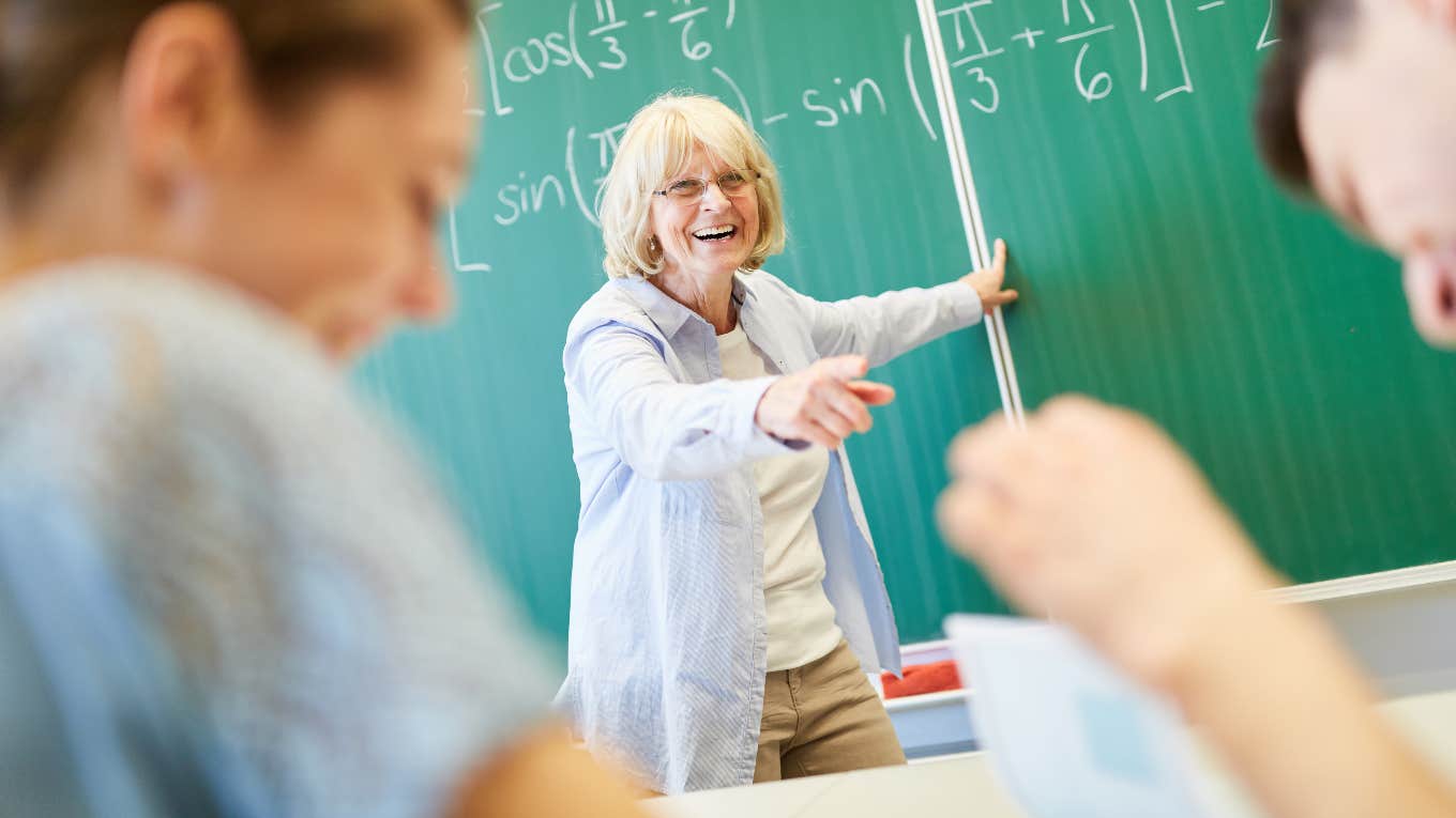 Teacher laughing even though she has no money in her bank account