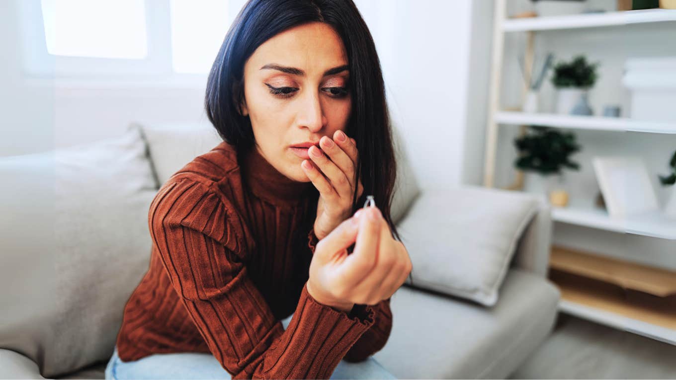 woman sitting on therapists couch realizing she's never been in love with her spouse