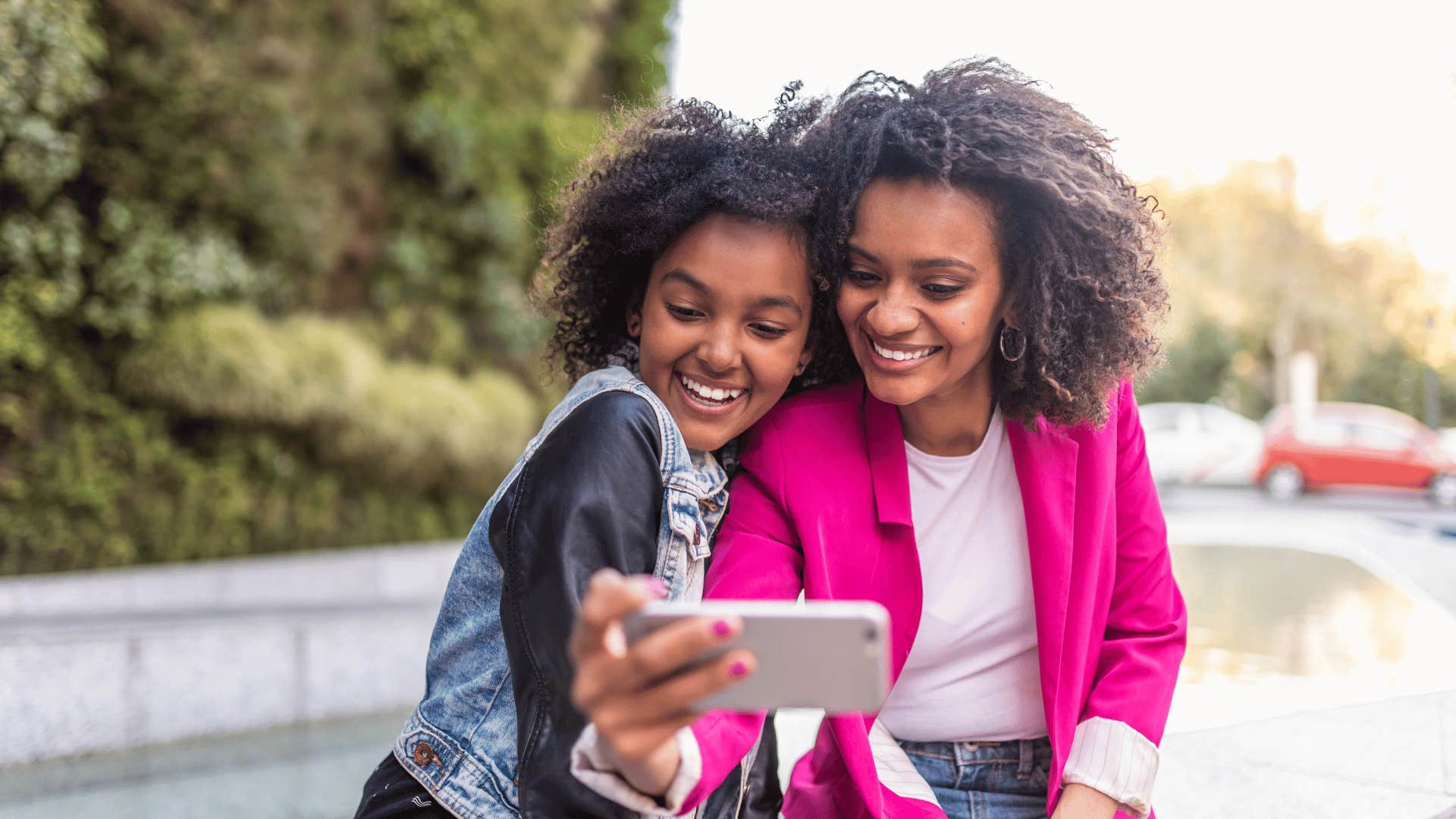 woman and child taking selfies