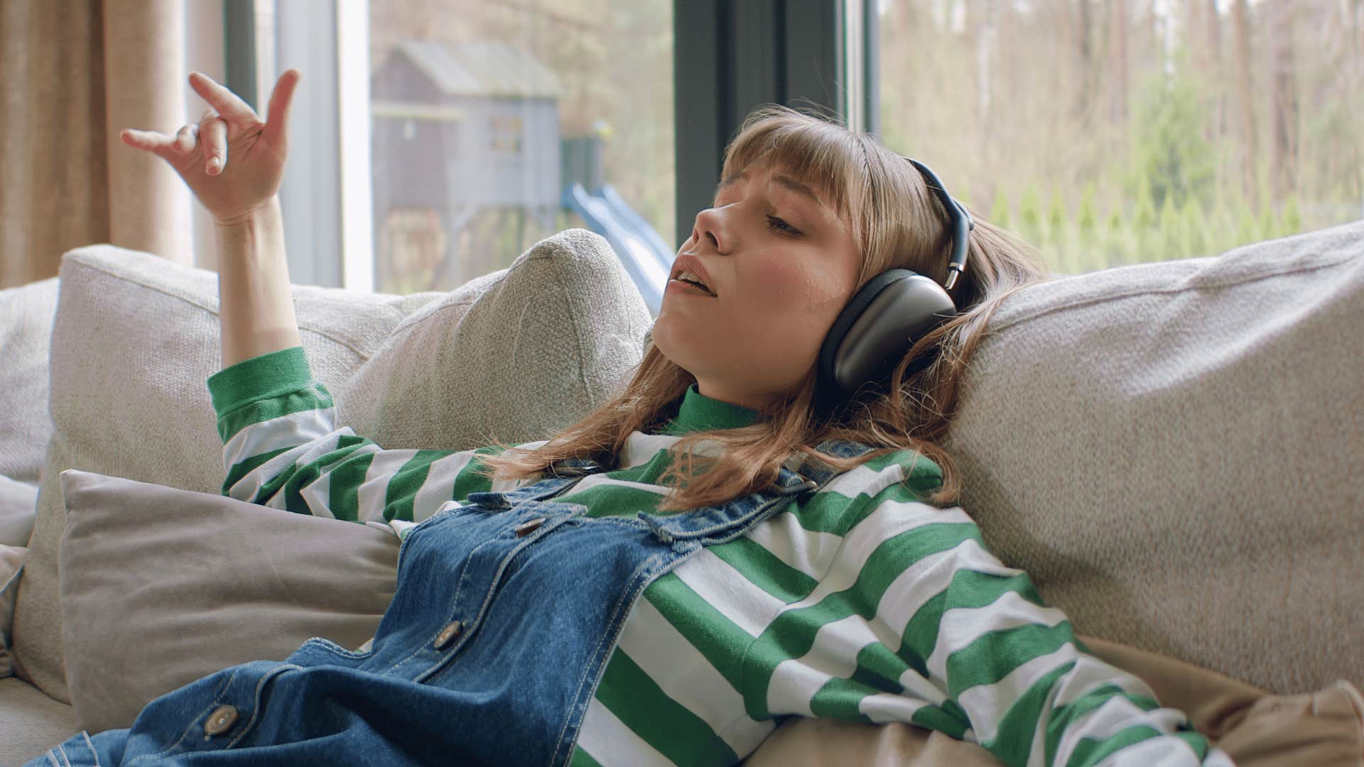 young woman with headphones on