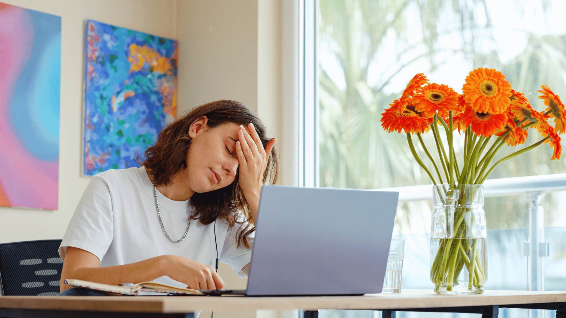 young woman using laptop