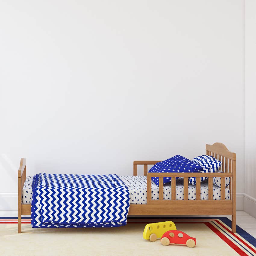 Toddler bed with kiddie safety rail