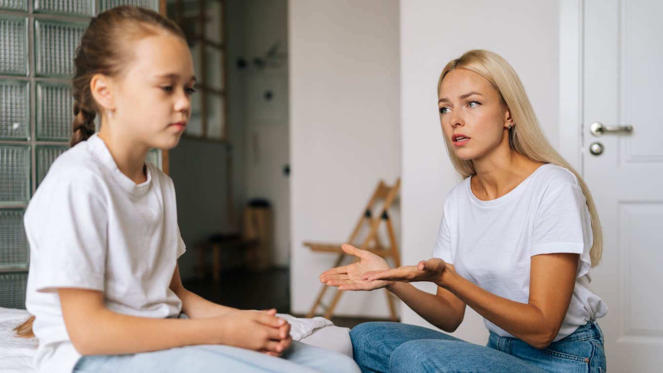 annoyed parent yelling at child