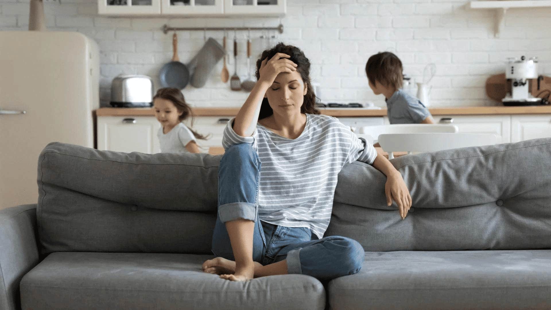 stressed mom on the couch