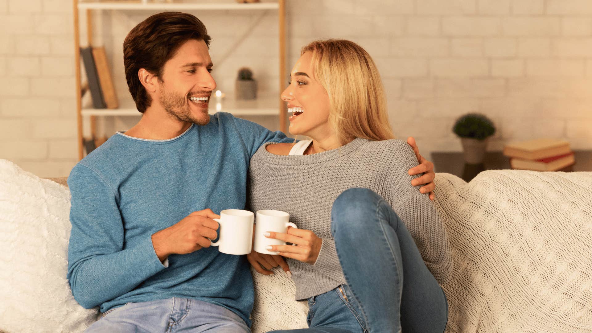 couple drinking coffee smiling