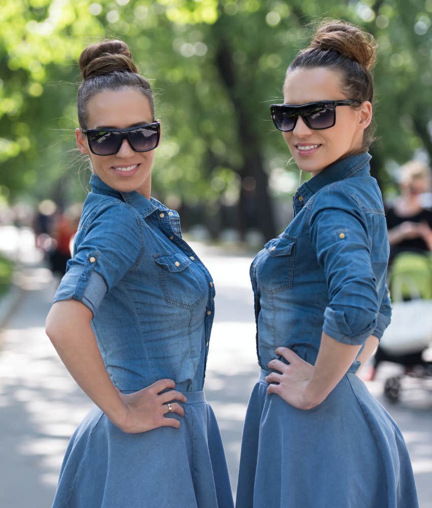 twin sisters in matching outfits