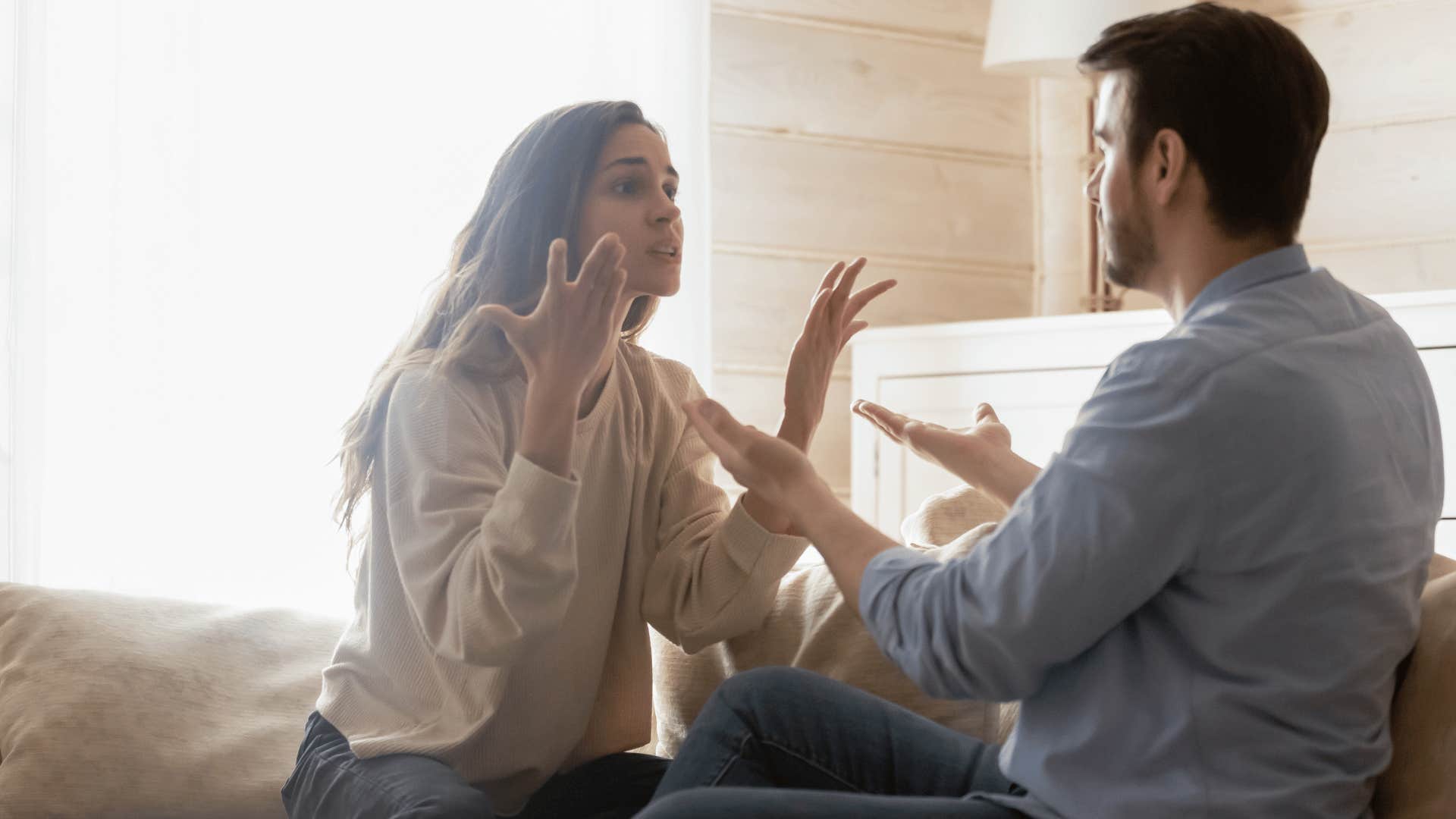 woman yelling at man while man gets defensive 