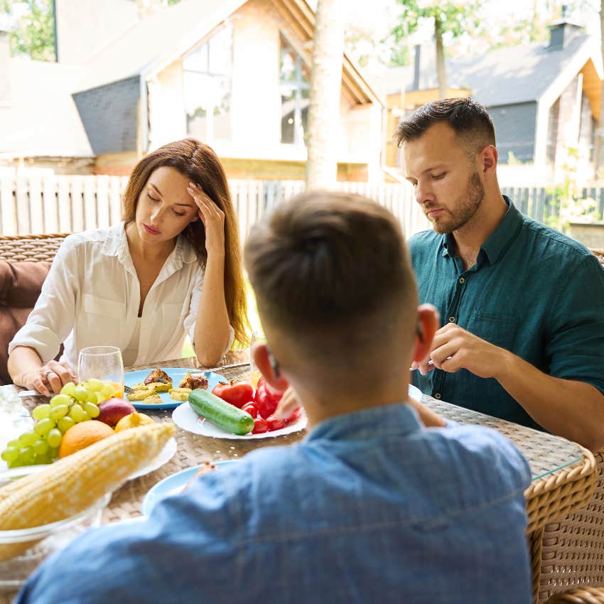 Tense family eating a vegetarian meal