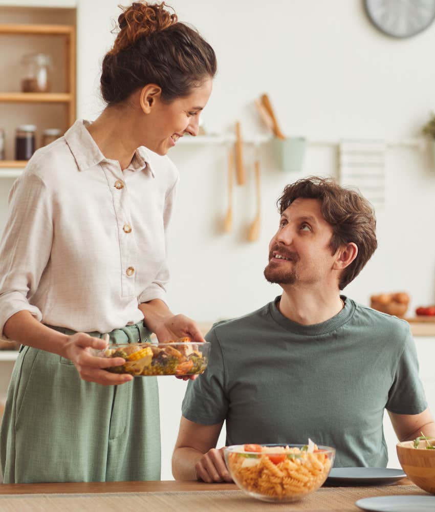 wife serving husband dinner