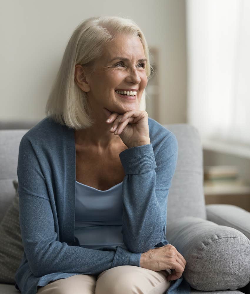 Woman smiling and feeling joyful