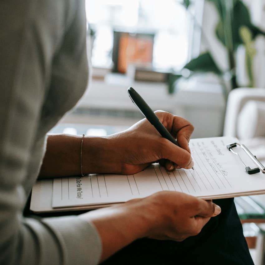 woman filling out forms