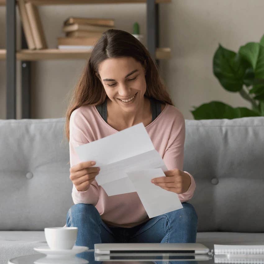 Worker happy about her company's weird company policy regarding payroll