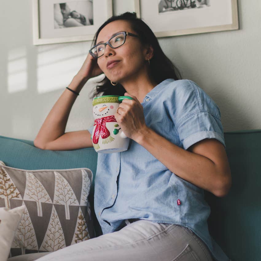 Woman relaxing on her "micro-retirement" with a cup of coffee.