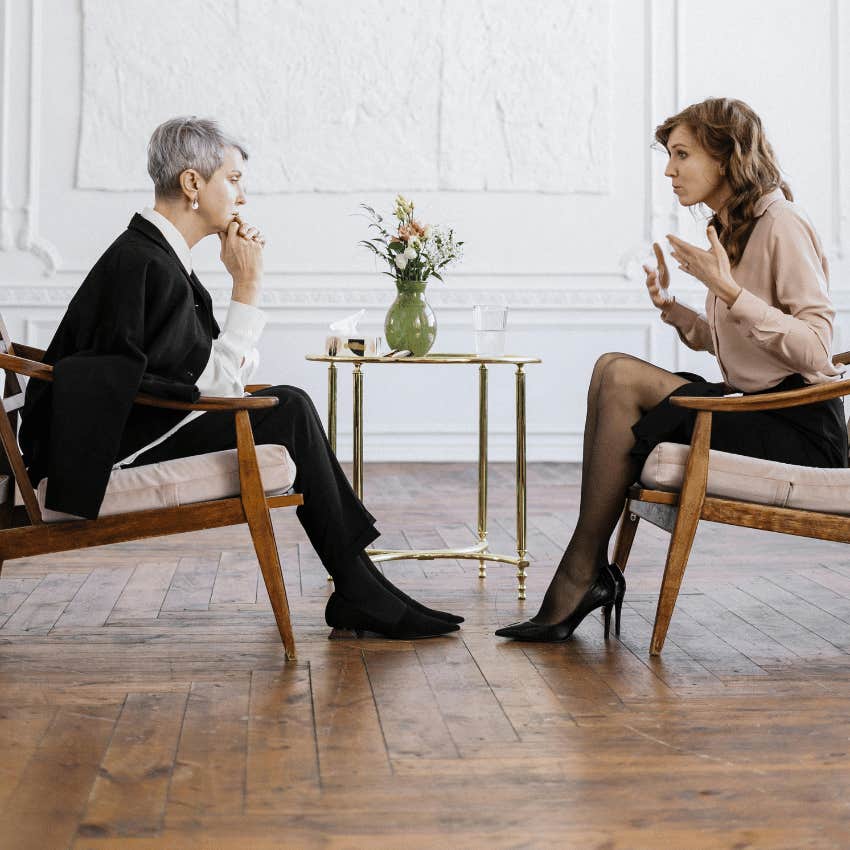 woman speaking to therapist