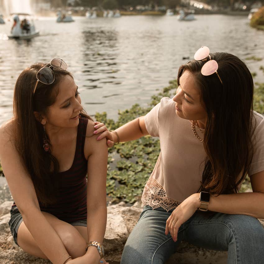 Two women talking about homelessness together. 