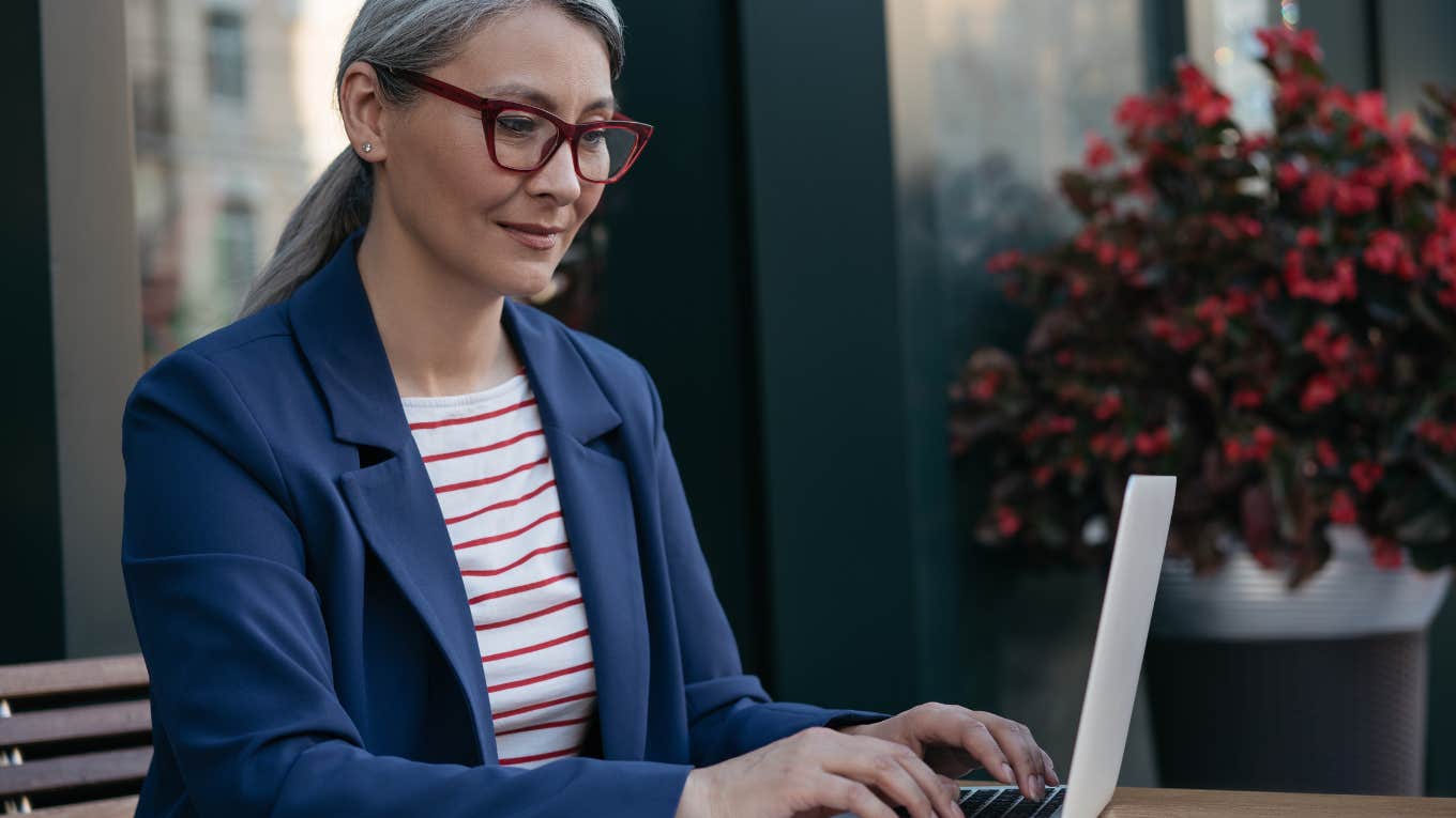 Woman happily working remotely