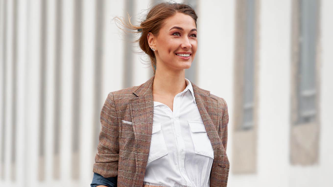 Woman walking away from work starting her "micro-retirement." 