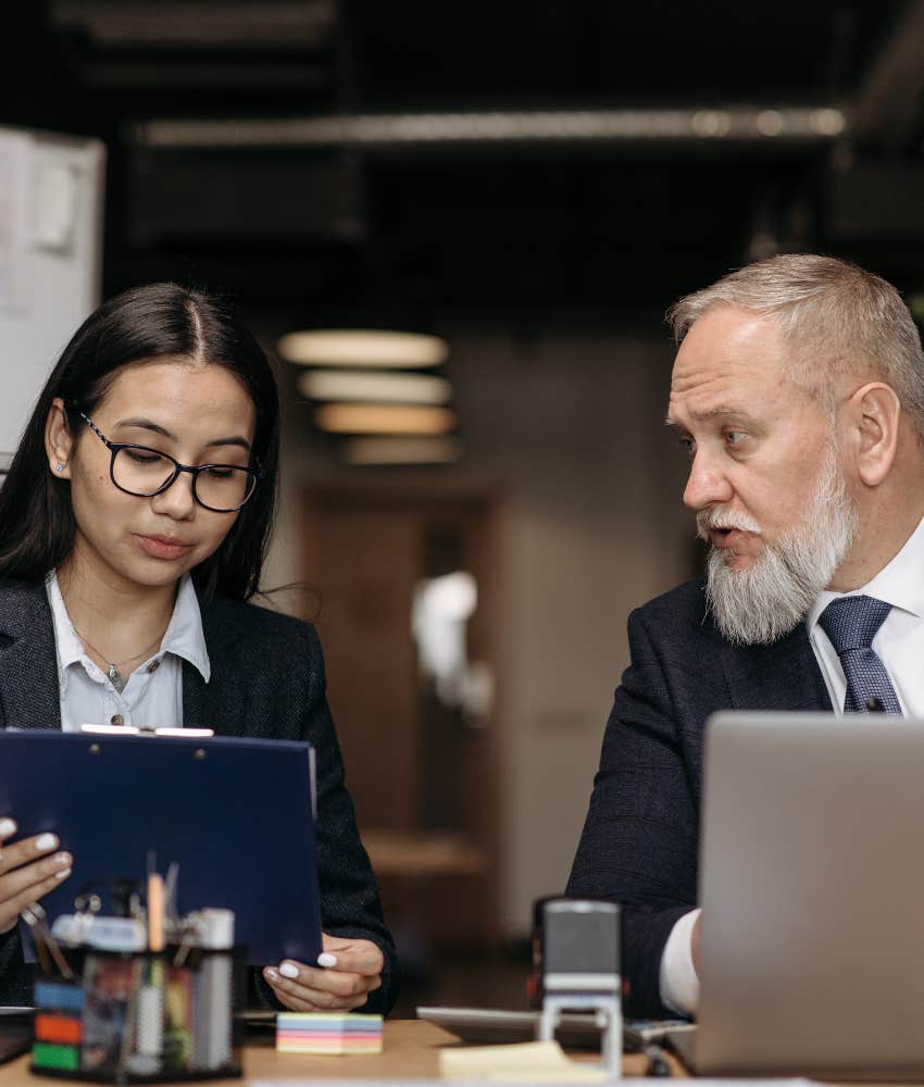 Young worker and boomer boss disagreeing