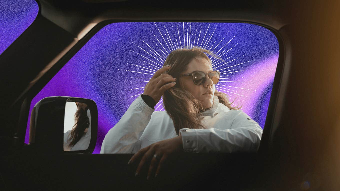 woman outside a car being showered with positive vibes september 30