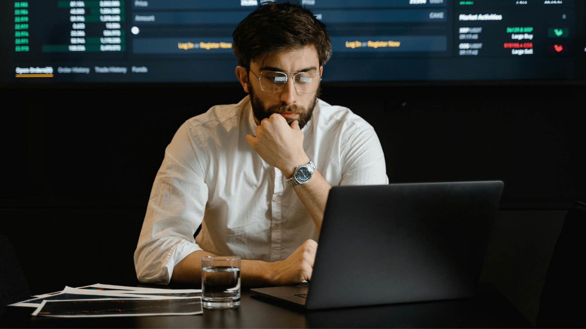 businessman focused on an open laptop