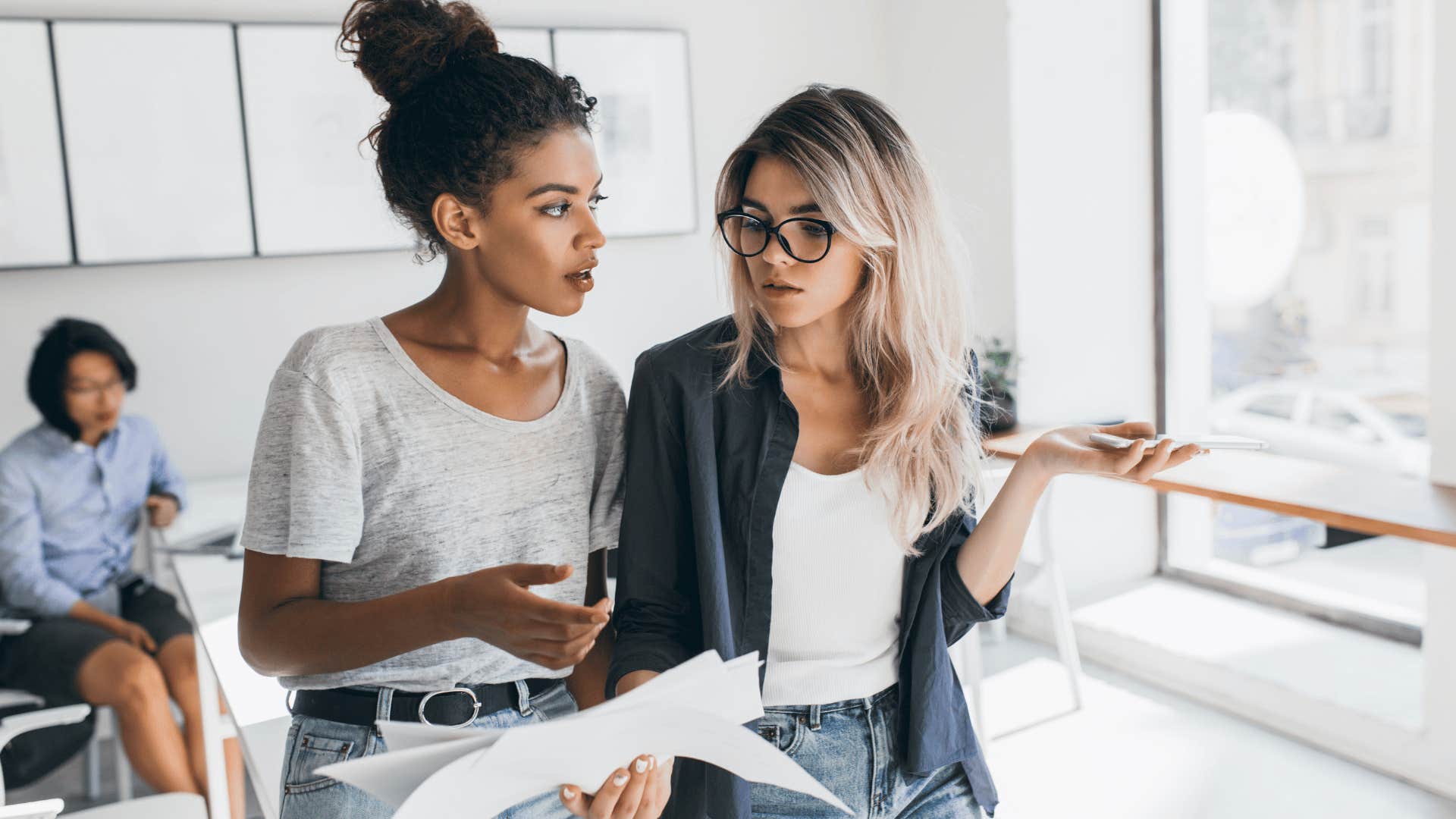 two woman working and planning together