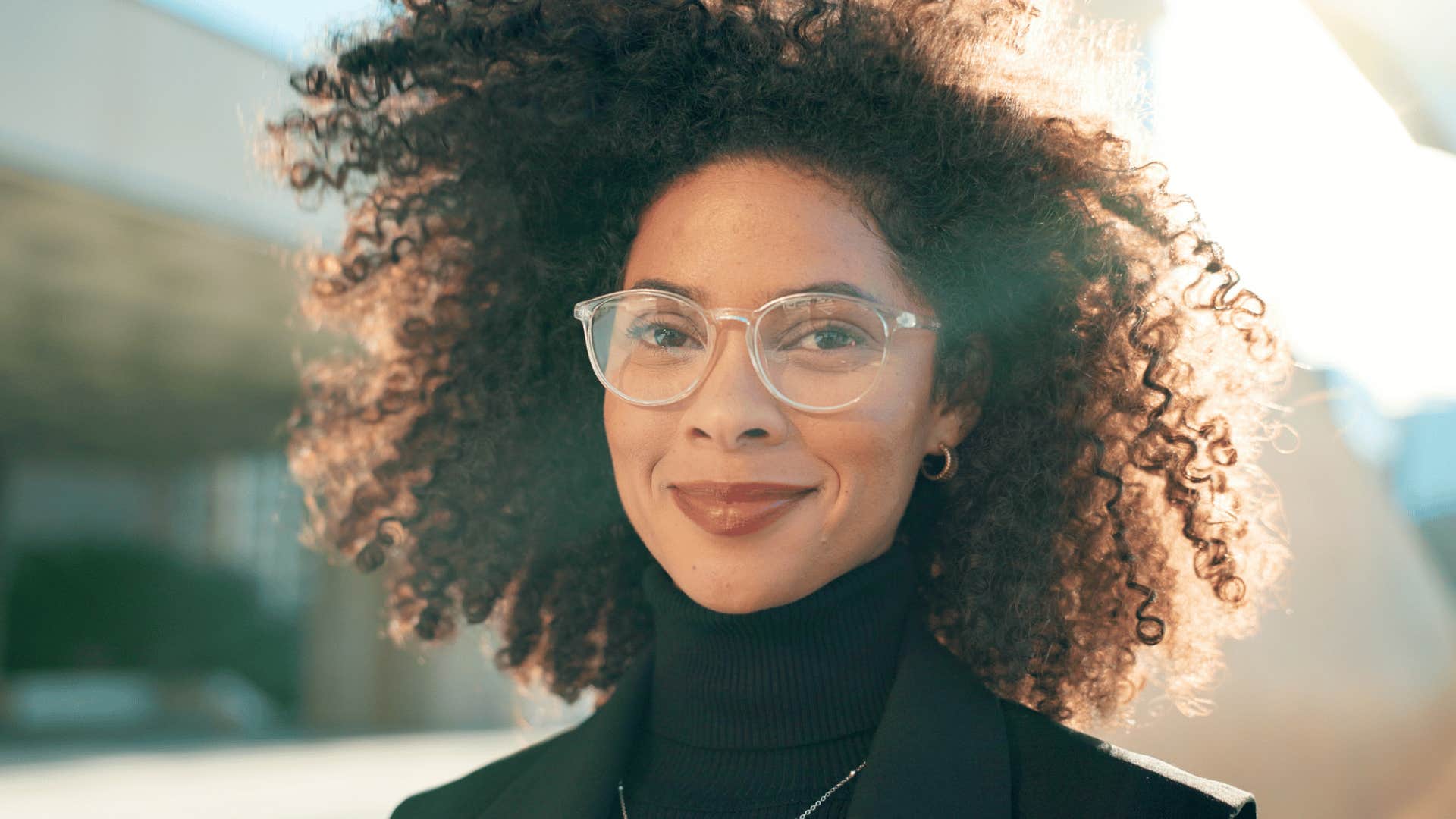 young black woman smiling softly