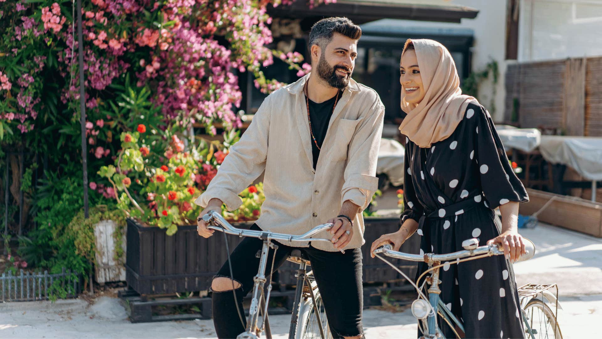 couple getting on their bikes