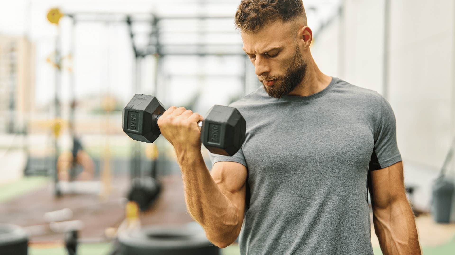 man lifting weights in the gym